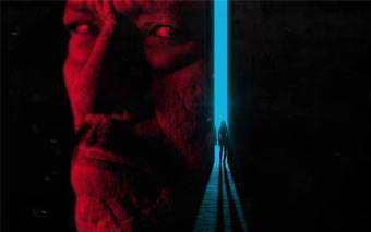 A close-up of a mans face, dramatically lit in red, dominates the left side like a scene from NATIONAL GEOGRAPHICs Map of Hell. In the background, a small silhouette stands in front of a bright vertical blue light.