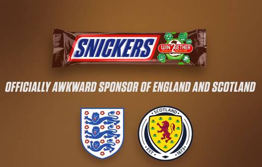 A Snickers bar appears above the text OFFICIALLY AWKWARD SPONSOR OF BOTHLANDS with the England and Scotland football team logos underneath.