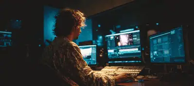 A person sits in a dimly lit room at a desk with multiple monitors, working on audio and video editing software—capturing the essence of filming in South Korea—surrounded by electronic equipment and illuminated by blue light.